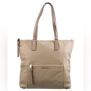 This is a Michael Kors Ariana Large Nylon Tote Bag in the color Dusk